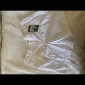 Nike golf shorts. New with tags   Size 4.